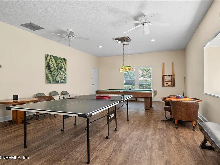 8140 Sutton Pl E — Photo 30