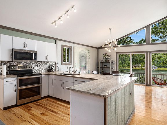 4th image of 6859 Woodland Dr