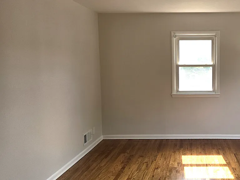 New hardwood floors and new picture window (not shown) offers great light into the living room.