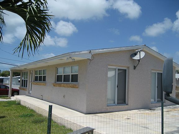 Side view and back patio area