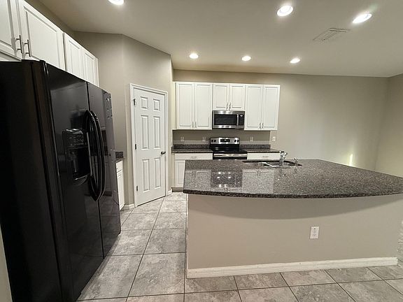 4th image of 7212 Grand Elm Dr