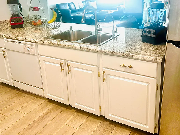 New quartz countertop. Updated cabinets with new hardware. New sink.