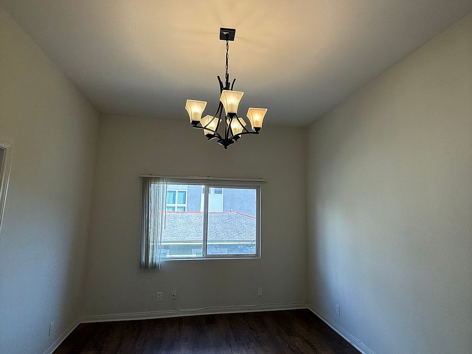Dining area with a chandelier