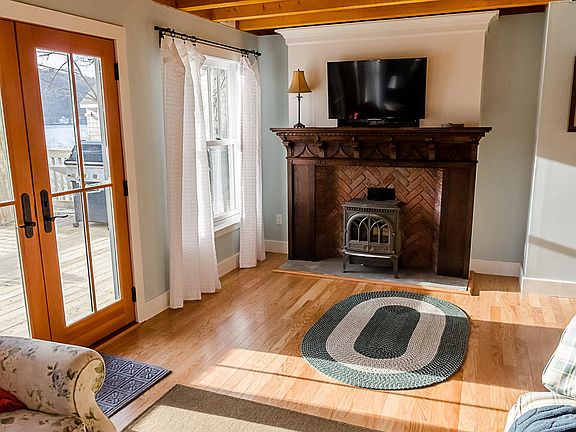 Living area, deck to left through doors .