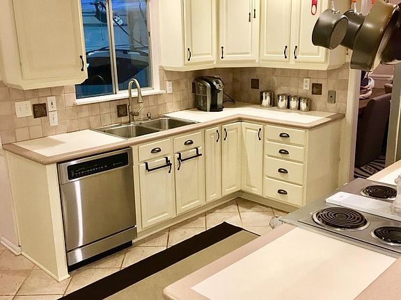 Kitchen (with a window view into the Garage)