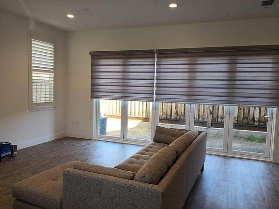 Bi-fold Glass door open to backyard