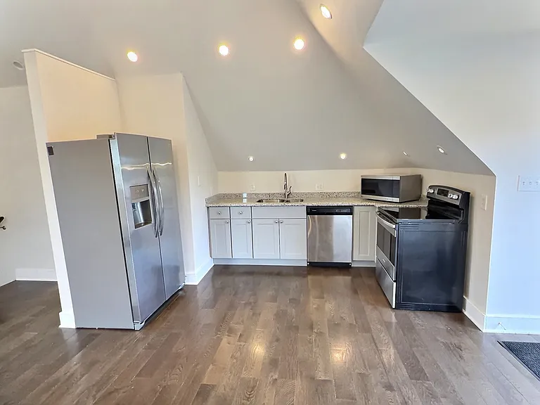 Kitchen with stainless steel appliances.