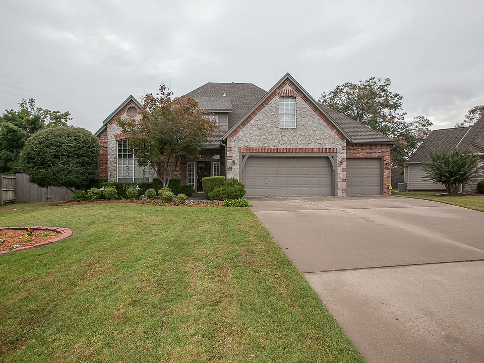 Partial Brick & Stone Country French Home