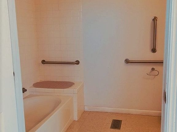 Third bath off the kitchen and casual family room.
