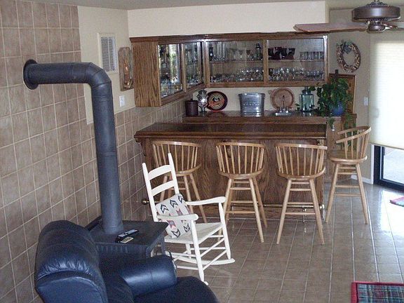 Lower level - Franklin stove plus a full oak bar