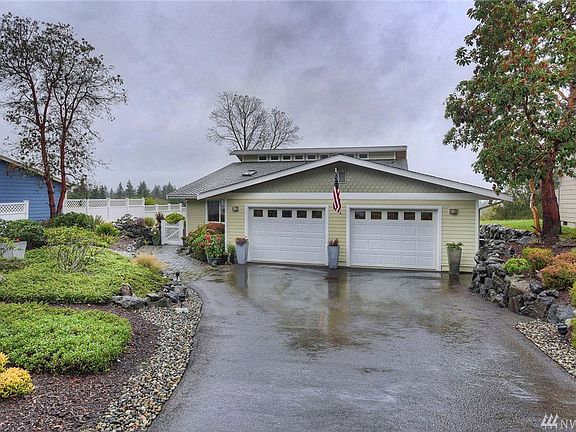 Professional landscaping was designed for no mowing ease and beauty. 