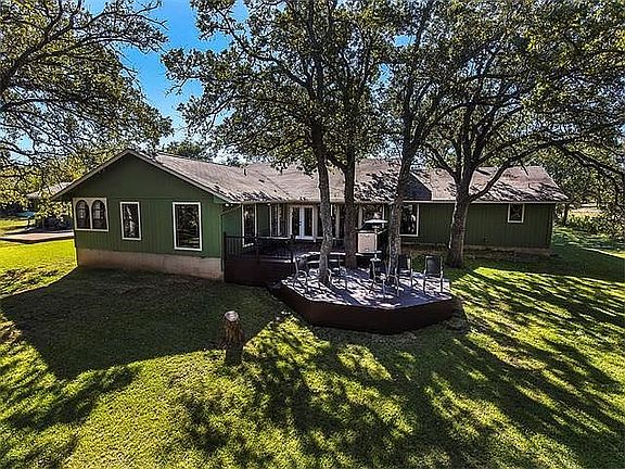 View of the nicely shaded back deck.