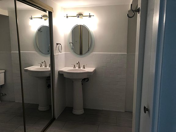 Bathroom with porcelain tile.