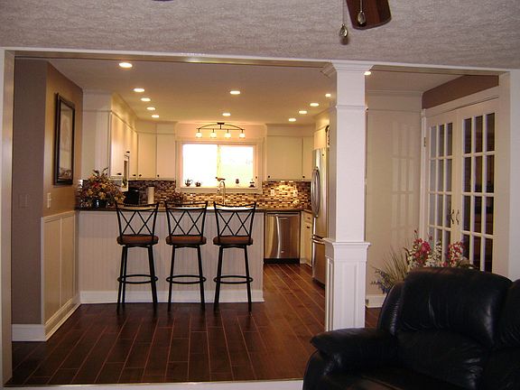 view of kitchen from living room, tile floors