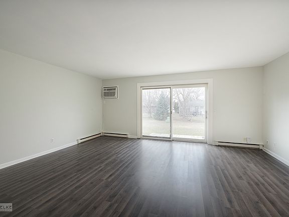 Fabulous new LVP flooring & freshly painted~This spacious, open room offers many possibilities!