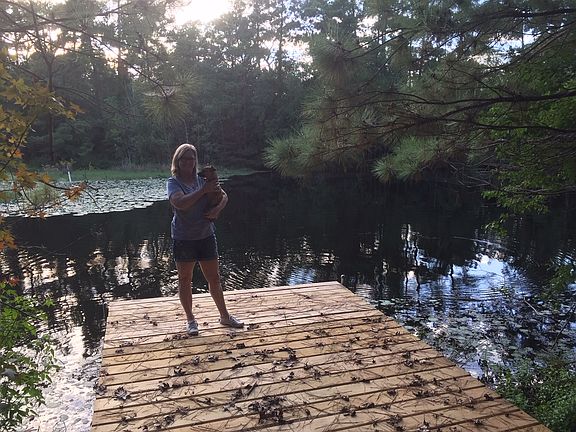 Fishing pier at back of land