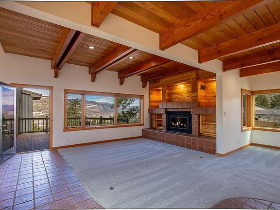 Living Room with views & wood burning fireplace