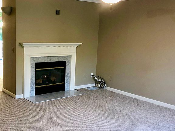 Living room with fireplace.
