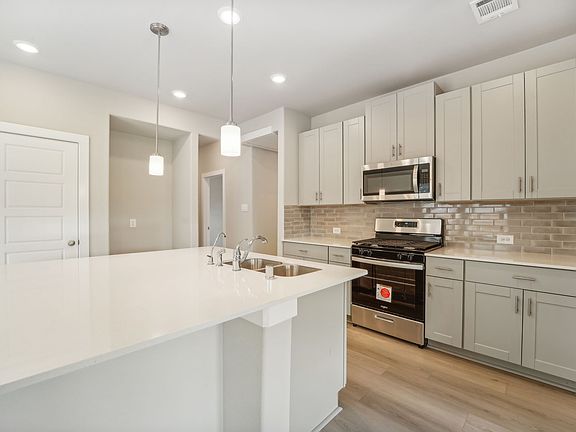 The kitchen in a home in Pine Lake Cove of Montgomery, TX.