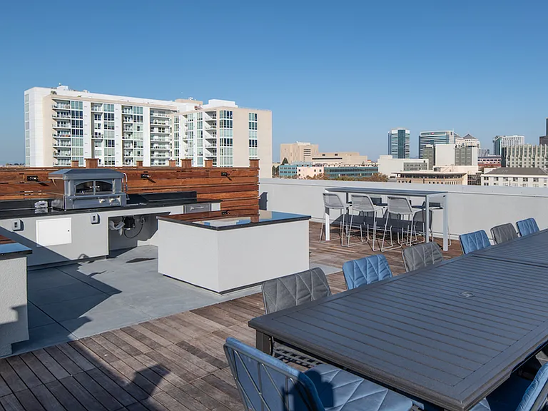 Outdoor pizza kitchen with views of Downtown