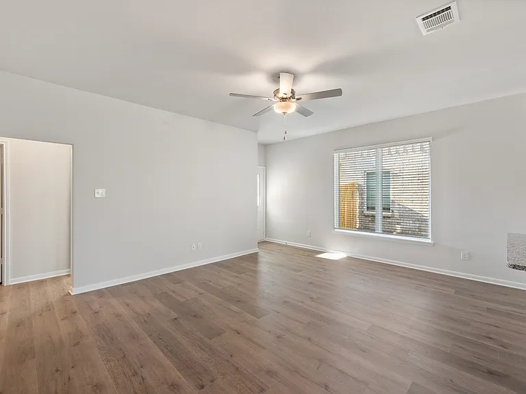 The family room has enough space for lots of furniture.