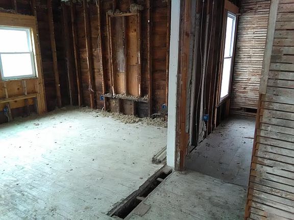 Walls down to bare studs