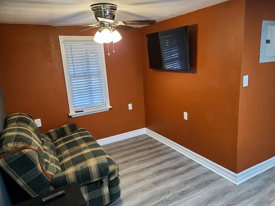 living room with a large flat-screen TV