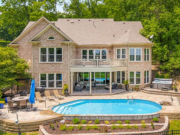 Enjoy resort-style living overlooking the 8th hole of Temple Hills Golf Course, complete with a private pool, hot tub, grill, fire pit, outdoor furniture, covered patio and more!