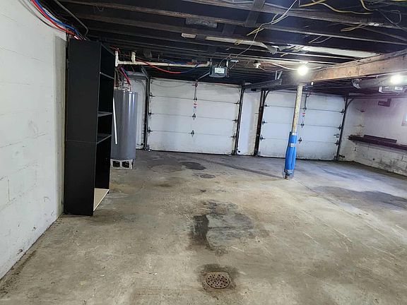 Spacious 2 car garage, laundry and storage