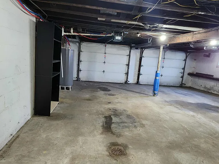 Spacious 2 car garage, laundry and storage
