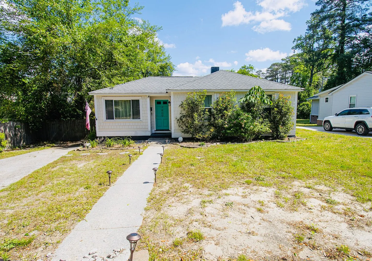 Adorable 3BR Rosewood Rental with Dreamy Porch & Fenced Yard! — Photo 3