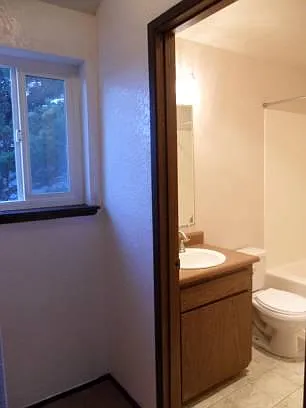 Bathroom on right. Closet (not pictured) on left