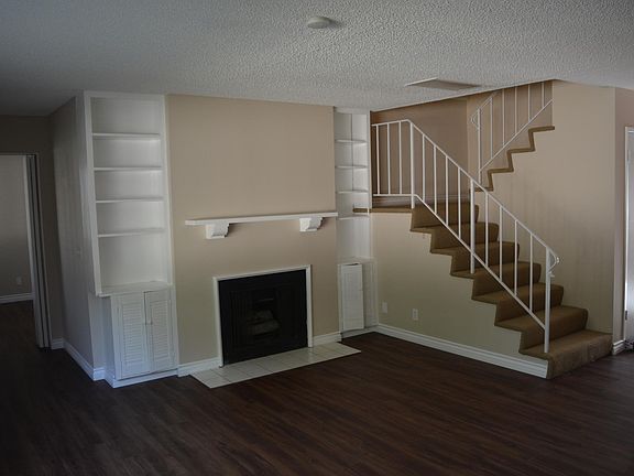 Down stair 1st Bedroom, Stair case & Fireplace