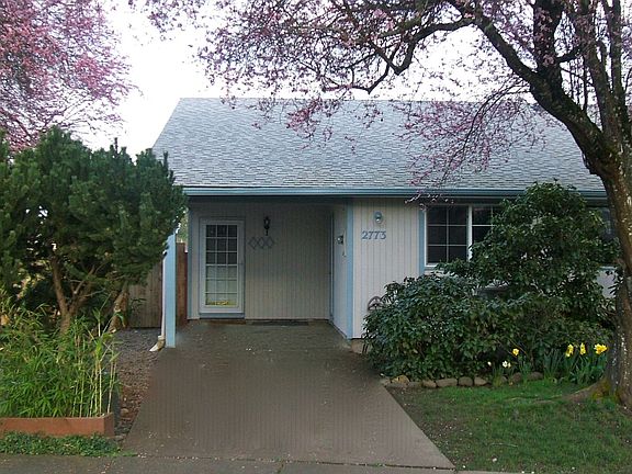 Front of Home with Carport
