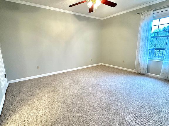 Primary bedroom with en-suite full bath and walk-in closet