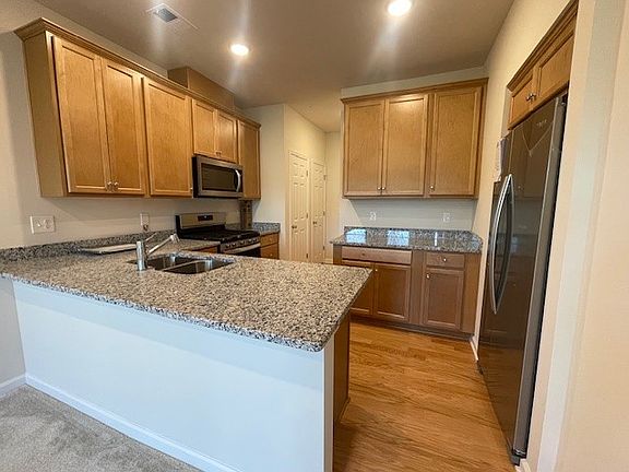 Ample counter space, storage cabinets & double sink & all new appliances in Kitchen