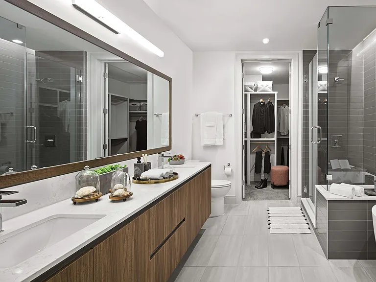 Spa-inspired luxury with double vanities, clean lines, and a relaxing soaking tub.