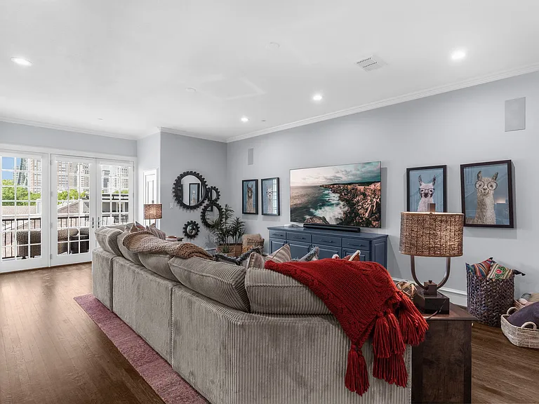 Spacious 4th-floor lounge designed for movie nights and relaxation.