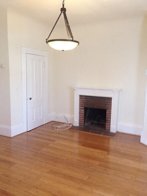 Living room with decorative fire place
