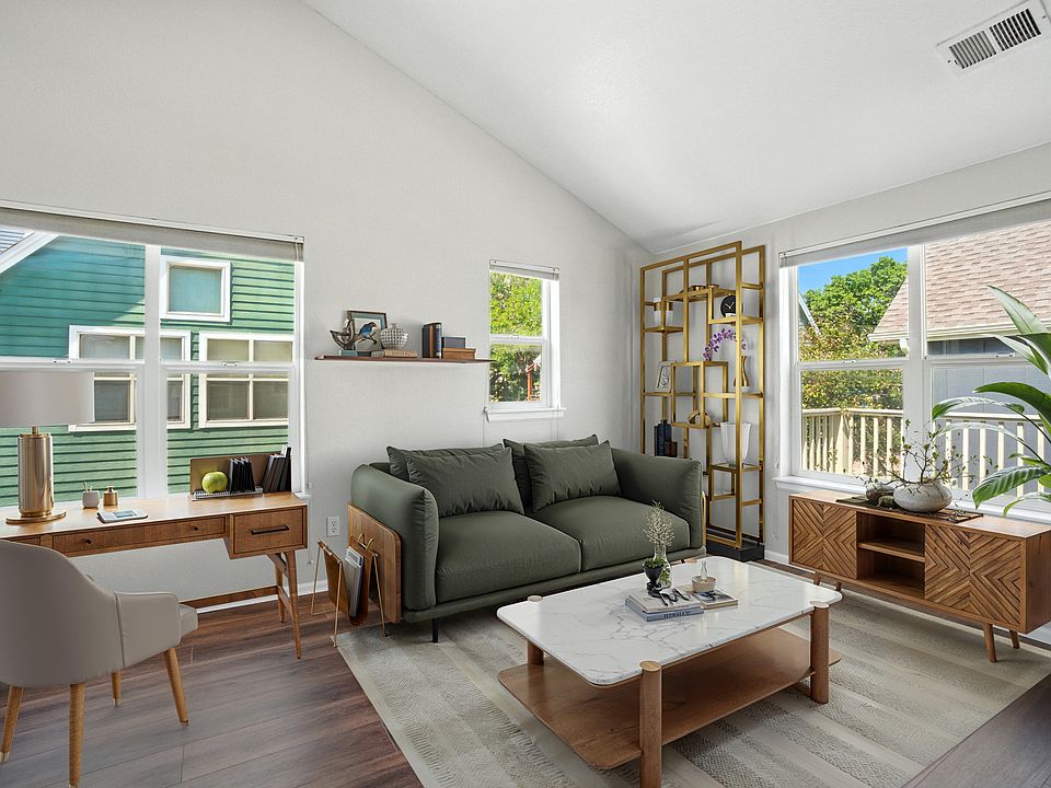 Living area with vaulted celing