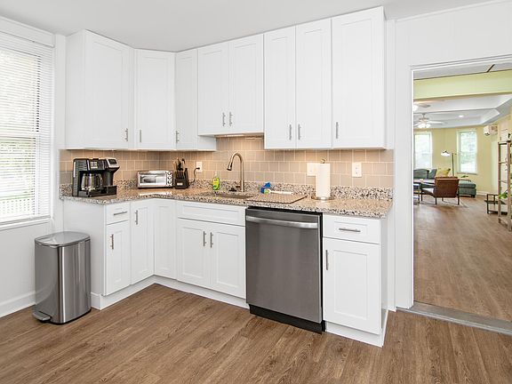 Kitchen with dual coffee maker, toaster oven and dishwasher
