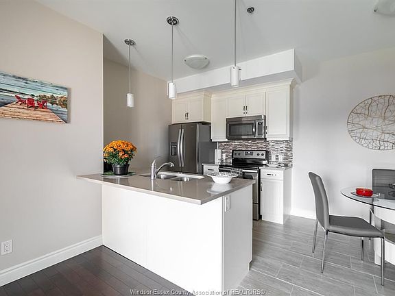 5th image of 8475 Wyandotte St E #310
