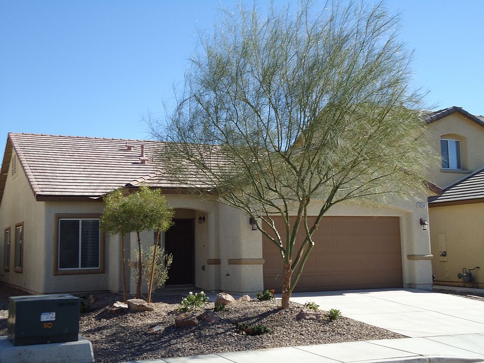 FRONT OF HOME MINUS TREE