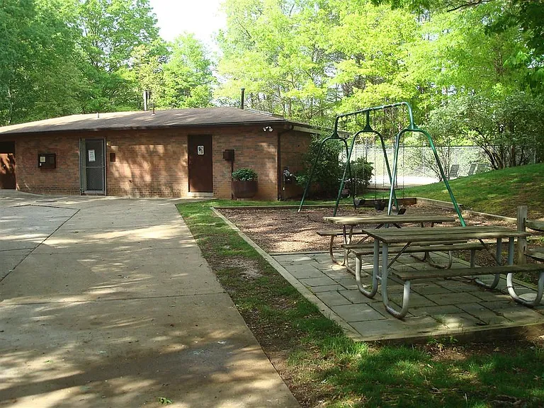Pool house and more picnic tables/swings