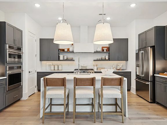 Kitchen with pendant lighting over island