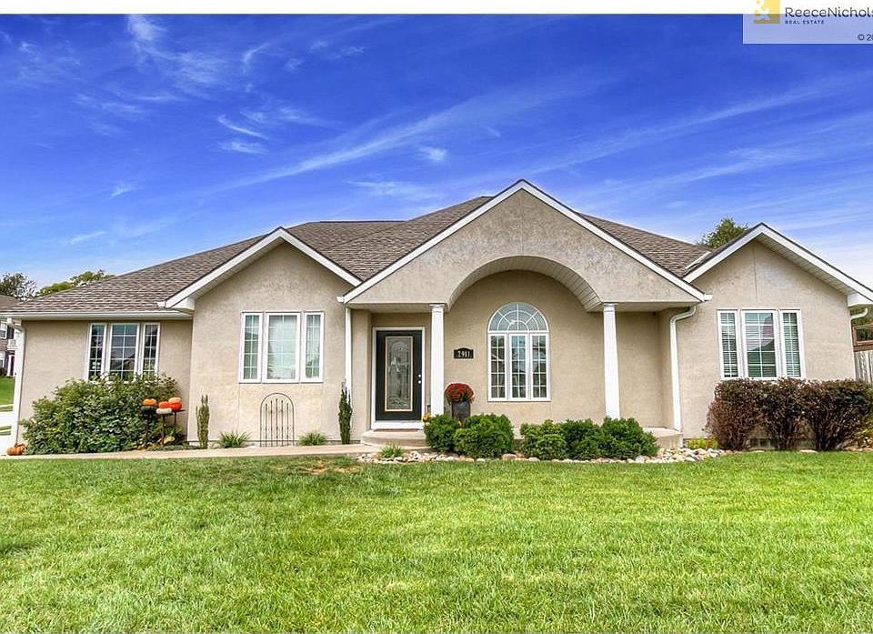 This is the front of the home on a corner lot. The exterior is Stucco.