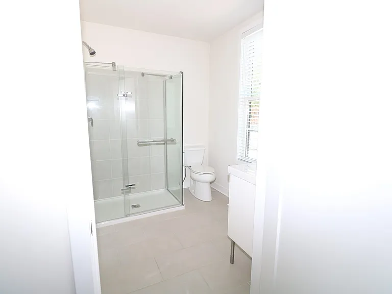 Second full bathroom with shared access between common living area and second bedroom