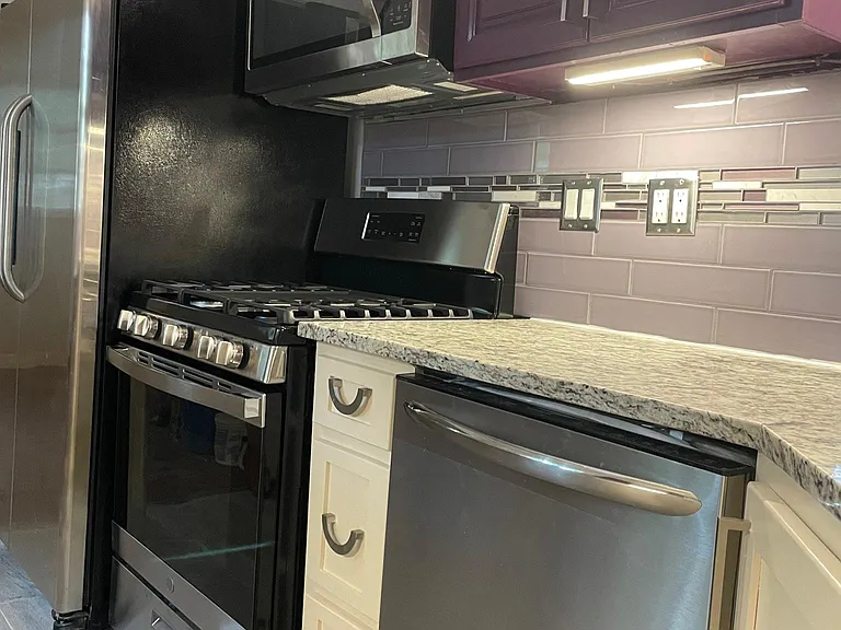 Full Appliance included .... with Gas Grill on Range plus over counter Microwave