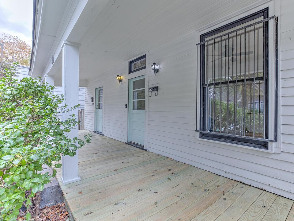 Large front porch shared with neighbor