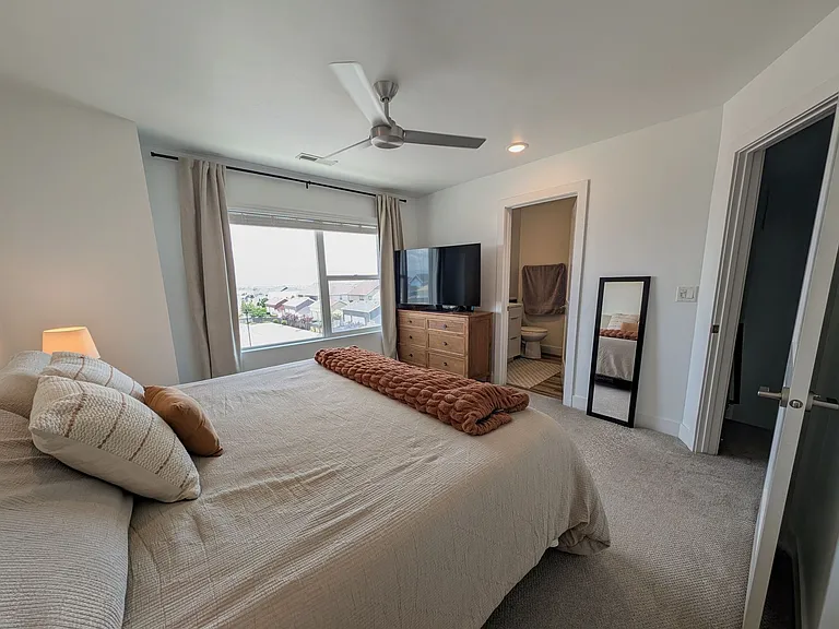 Primary bedroom with primary bathroom